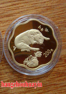 2007 pig 1/2oz scallop gold coin